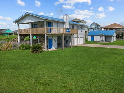 Cabin and extra garage sit on 3 lots. | Image 1