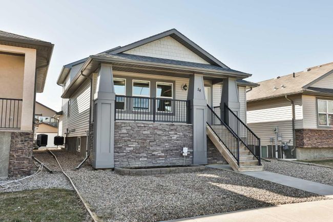 54 Sunridge Boulevard W, Home with 3 bedrooms, 3 bathrooms and 4 parking in Lethbridge AB | Image 1