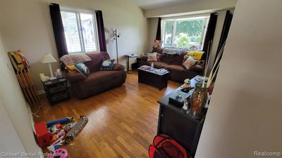 Living room with bay window and cathedral ceiling | Image 3