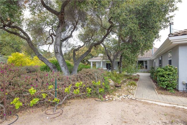 Lush landscaping throughout the property | Image 57