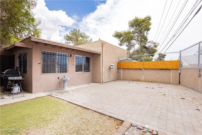 Back of house featuring stucco siding and a patio | Image 21
