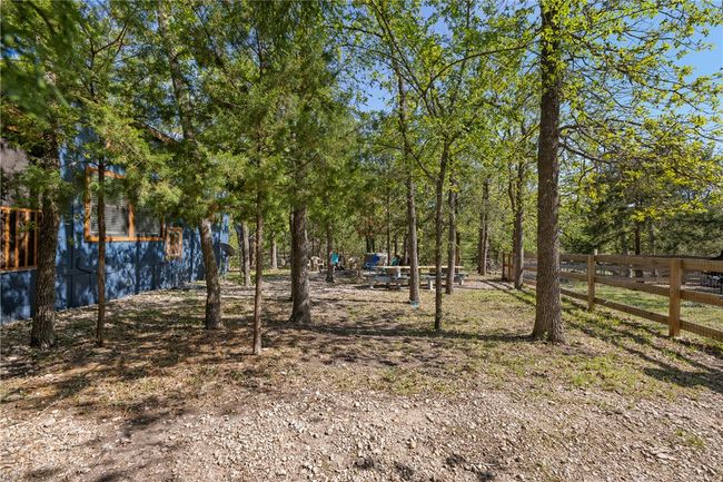 View of yard with fence | Image 19