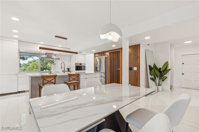 Dining room and kitchen | Image 4