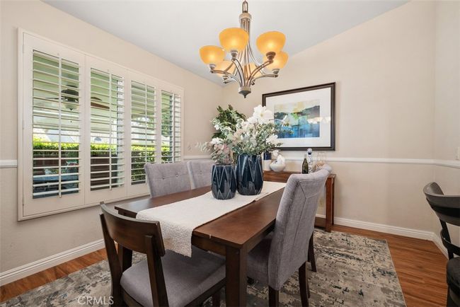 Here is a closer look at the spacious dining room area | Image 21