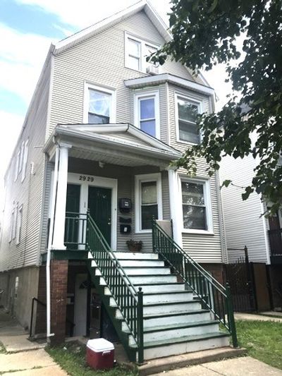 2929 N Springfield Avenue, Home with 6 bedrooms, 3 bathrooms and 2 parking in Chicago IL | Image 1