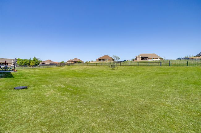 View of yard featuring fence | Image 31
