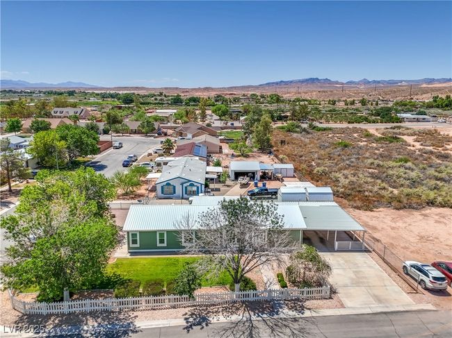 Aerial view of property and surrounding area with mountains | Image 5