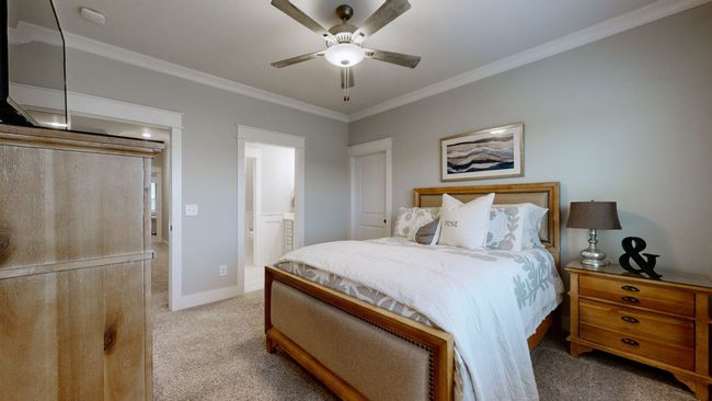 Alternate view of the upstairs bedroom showcasing direct access to the Jack & Jill bath and spacious closet—ideal for everyday comfort and functionality. | Image 46