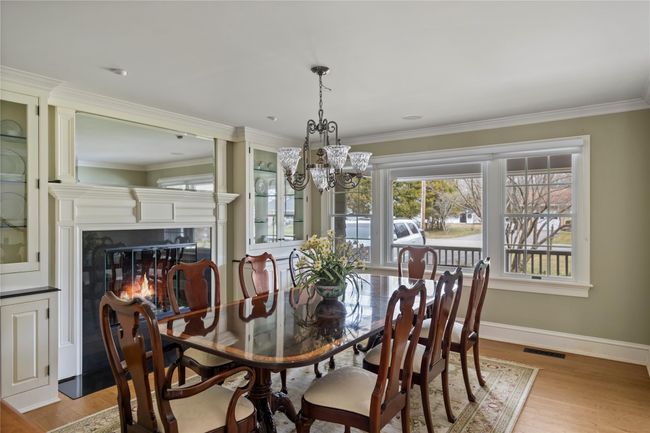 Formal Dining Room with Gas Fireplace | Image 13