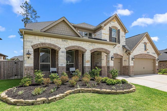 Landscaped front lawn to enjoy our evenings out. | Image 5