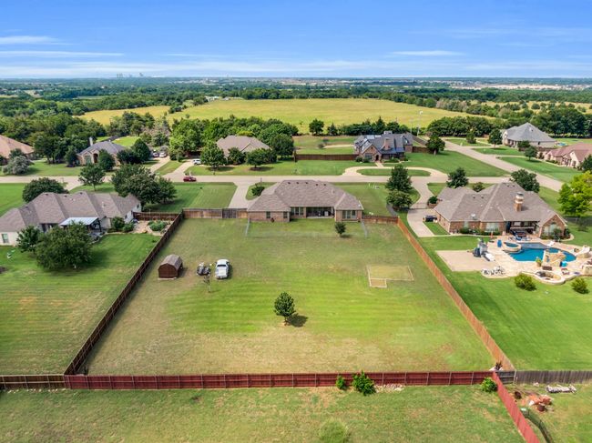 Aerial perspective of suburban area with a pool | Image 23