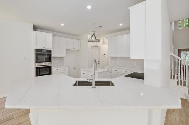Gourmet Kitchen with Quartz Countertops and Stainless Steel Appliances | Image 10