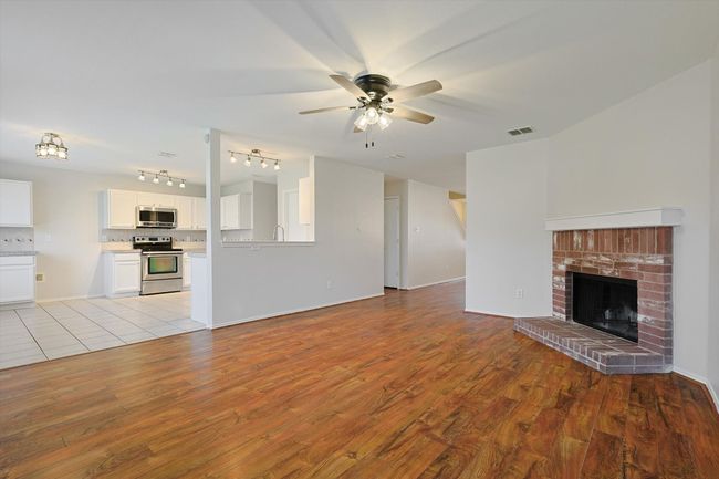 Living room with a Fireplace | Image 9