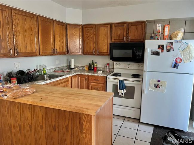 7262 Hazelcrest Dr, Townhouse with 4 bedrooms, 2 bathrooms and null parking in Hazelwood MO | Image 6