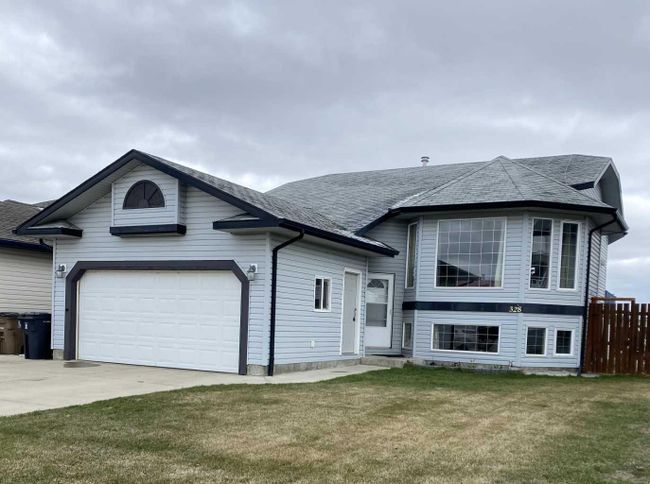 328 14 Street E, Home with 5 bedrooms, 3 bathrooms and 6 parking in Brooks AB | Image 1