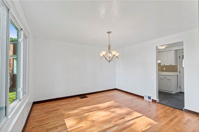 Dining Room (12x11), at front of home with doorway to kitchen | Image 3