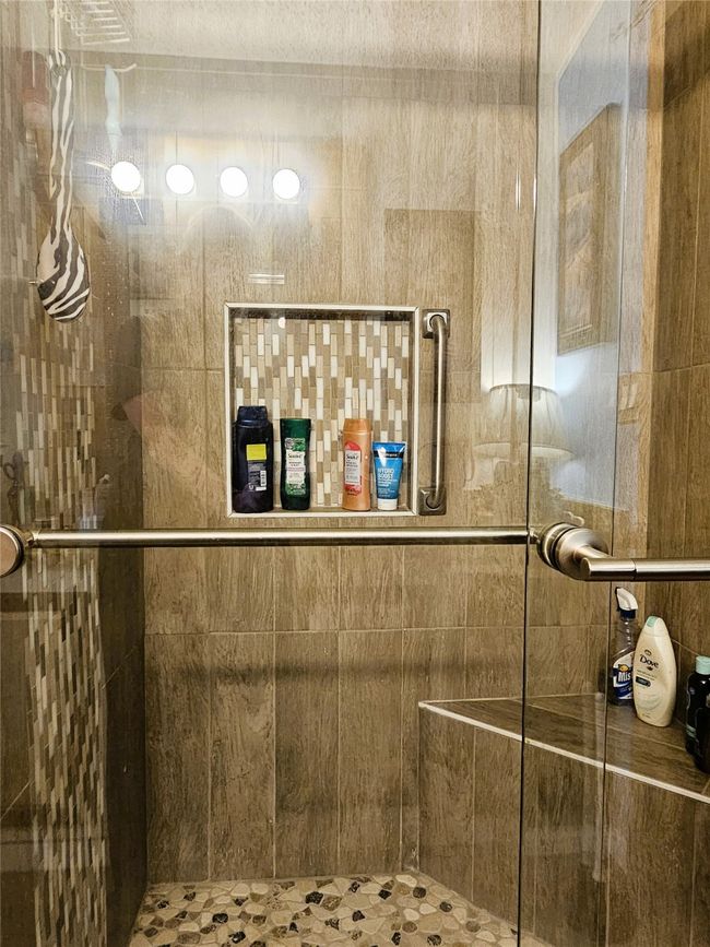 Bathroom featuring a shower stall | Image 13