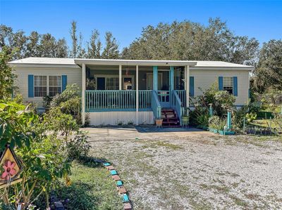 9045 Burr Drive, House other with 4 bedrooms, 2 bathrooms and null parking in Polk City FL | Image 2