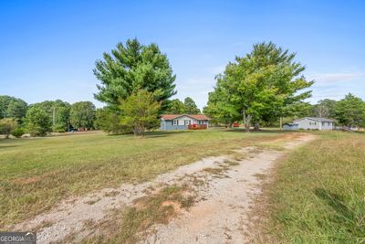 555 Harris Drive, House other with 3 bedrooms, 2 bathrooms and 2 parking in Locust Grove GA | Image 3