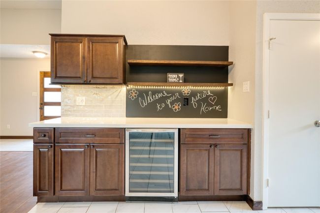 Butler’s pantry with wine fridge and chalkboard backsplash! | Image 11