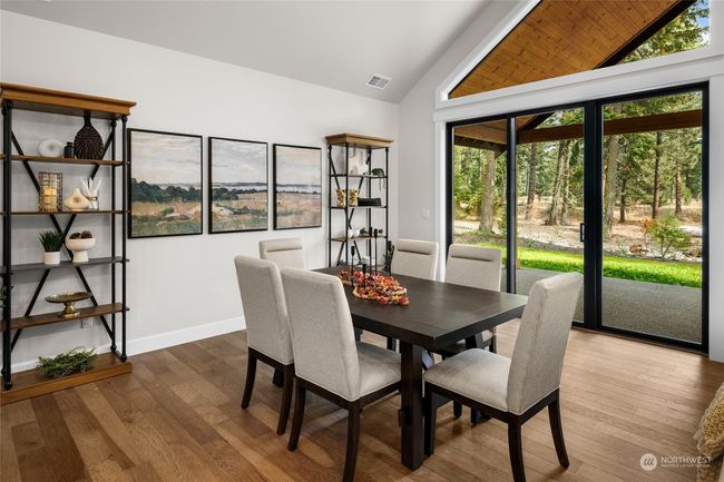 Dining room with plenty of entertainment space | Image 15