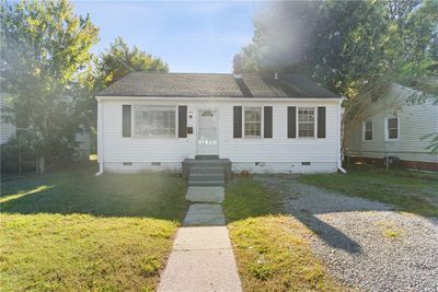 Bungalow-style house with a front yard | Image 2