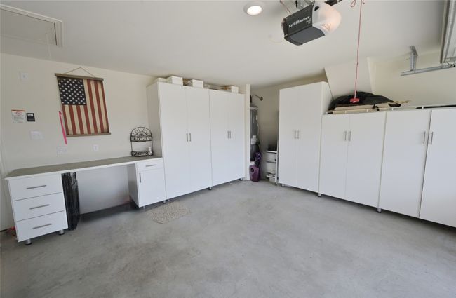 Custom Cabinets and Work Bench built by California Closet in Garage | Image 30