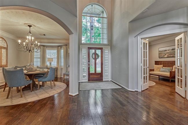 To the left of front door is your Home Office/Study. To the right is your Formal Dining. Large window over entry allows for beautiful natural light. | Image 6