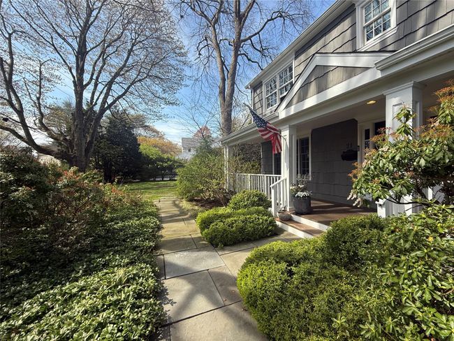 View of property exterior featuring a porch | Image 23