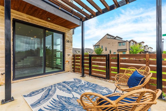 View of patio with a pergola and a residential view | Image 28