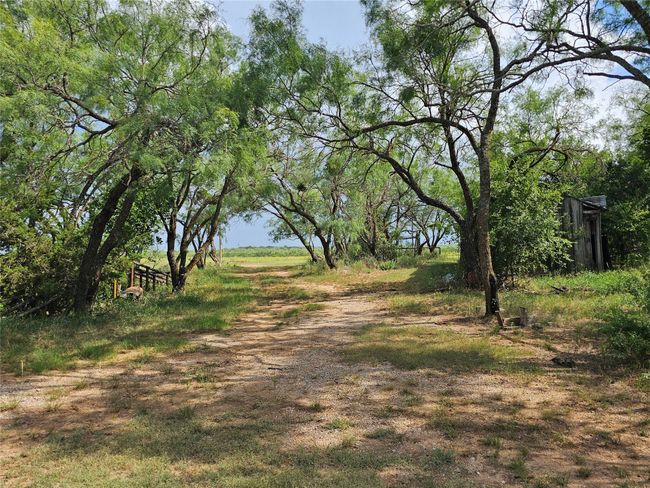 View of dirt / gravel road | Image 13
