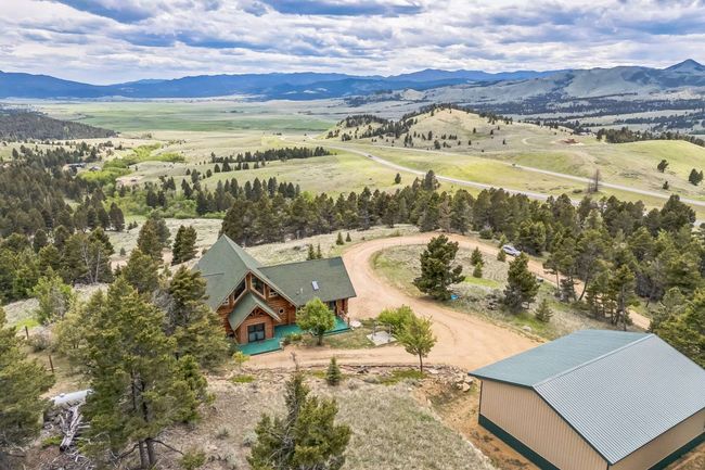 View of subject property featuring mountains | Image 11