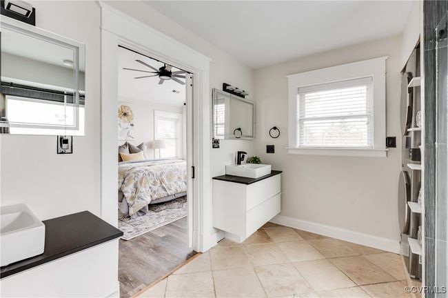 Ensuite bathroom featuring tile patterned flooring, vanity, baseboards, a ceiling fan, and ensuite bathroom | Image 41