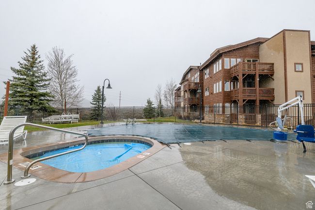 Community pool featuring a patio | Image 26