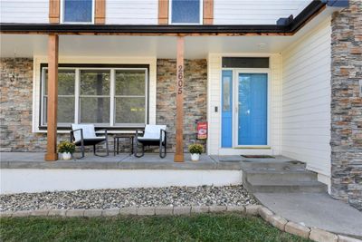 Entrance to property featuring covered porch | Image 3