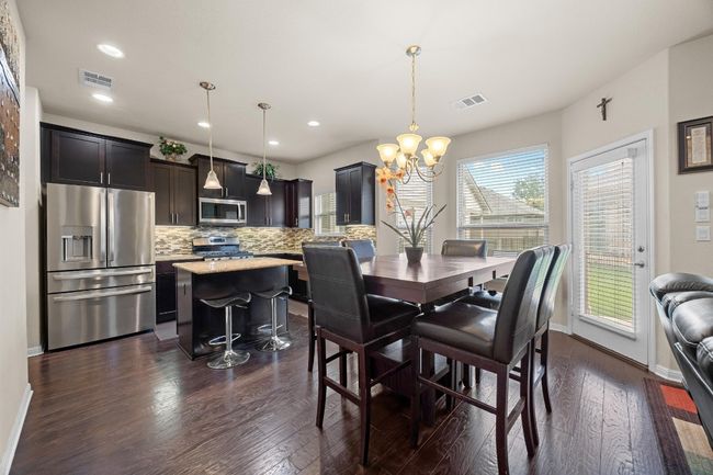 The open concept floor plan provides for seamless connectivity throughout the main living area. | Image 12