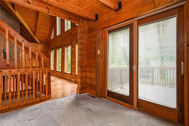 Access to another deck overlooking the front of the property. | Image 17