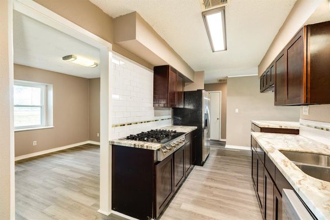 Kitchen looking into dining room | Image 10