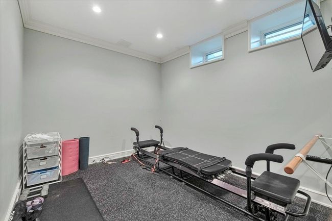 Gym featuring recessed lighting; perfect for getting in your workout (possible 5th bedroom). | Image 24