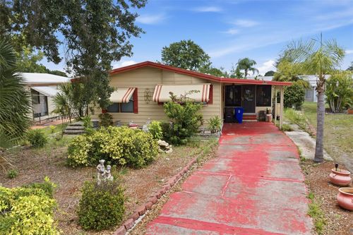 410 Dolphin Dr S, OLDSMAR, FL, 34677-2418 | Card Image