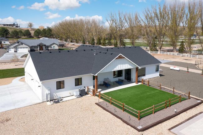 Back of property with roof with shingles | Image 39