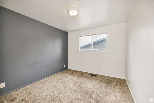 Empty room featuring carpet floors | Image 15