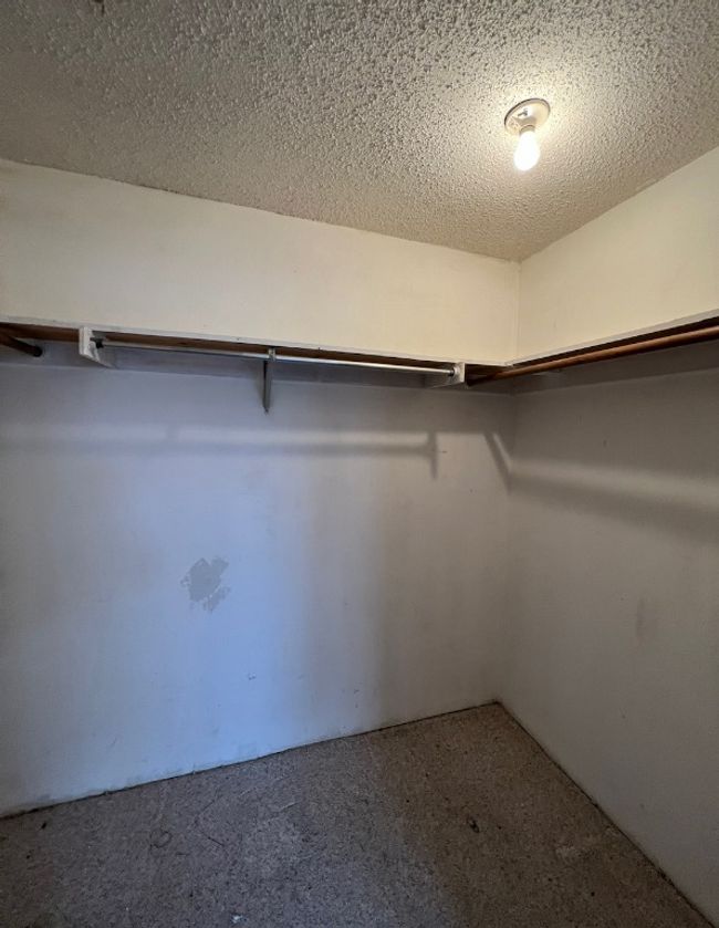 View of walk in closet | Image 8