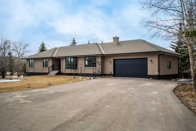 260011 Range Road 25, Home with 4 bedrooms, 3 bathrooms and 4 parking in Rural Rocky View County AB | Image 1