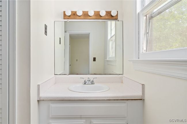 Bathroom featuring vanity | Image 14