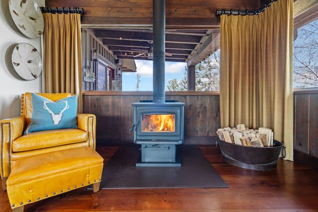 Living room with large South facing window. | Image 15