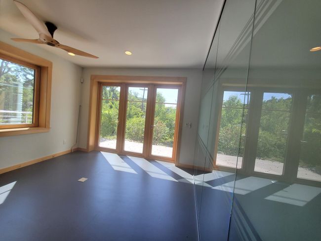 Break room with patio doors to outdoor patio space | Image 9
