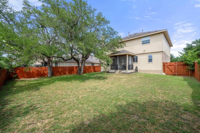 Back of property featuring a sunroom and stucco siding | Image 32