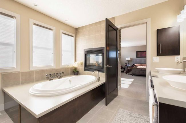 67 Tusslewood View Nw, Home with 4 bedrooms, 3 bathrooms and 4 parking in Calgary AB | Image 25