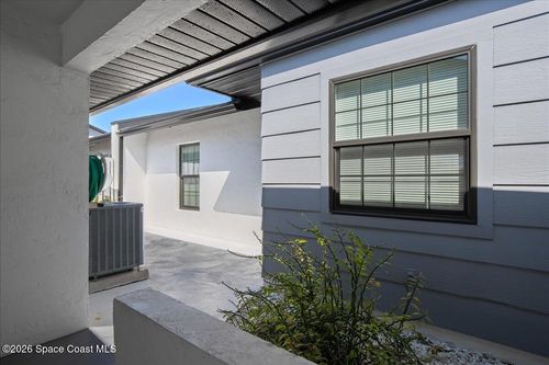 719 Palm Springs Cir, Indian Harbour Beach, FL, 32937-2671 | Card Image